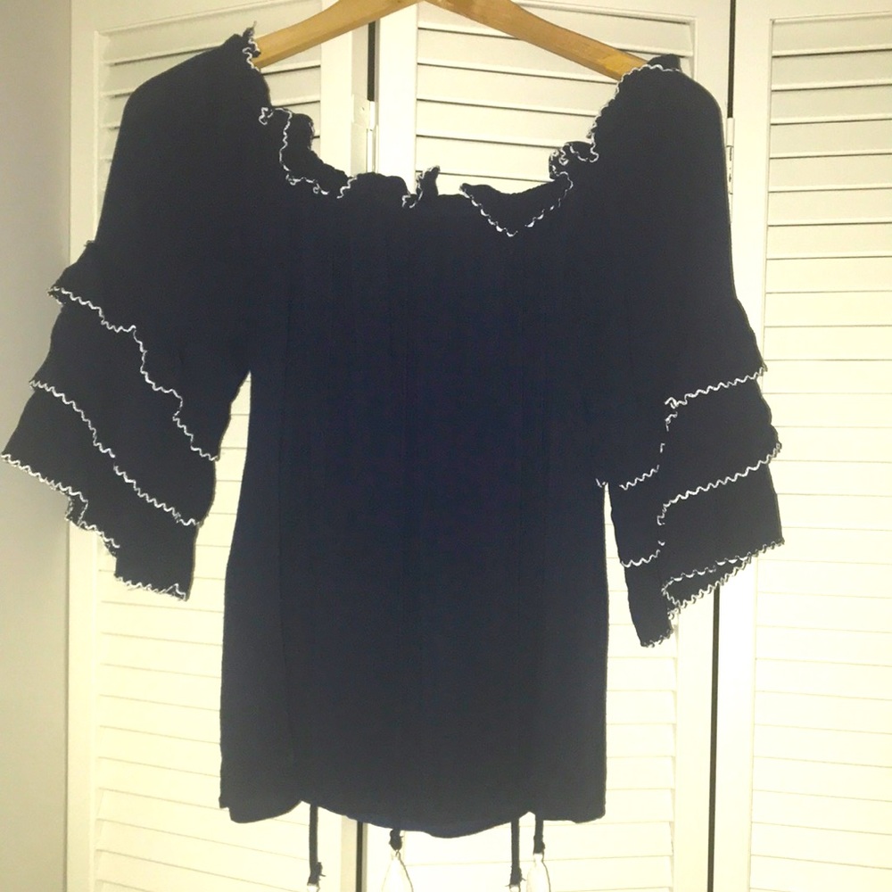 Cute and Fun blouse with tassels